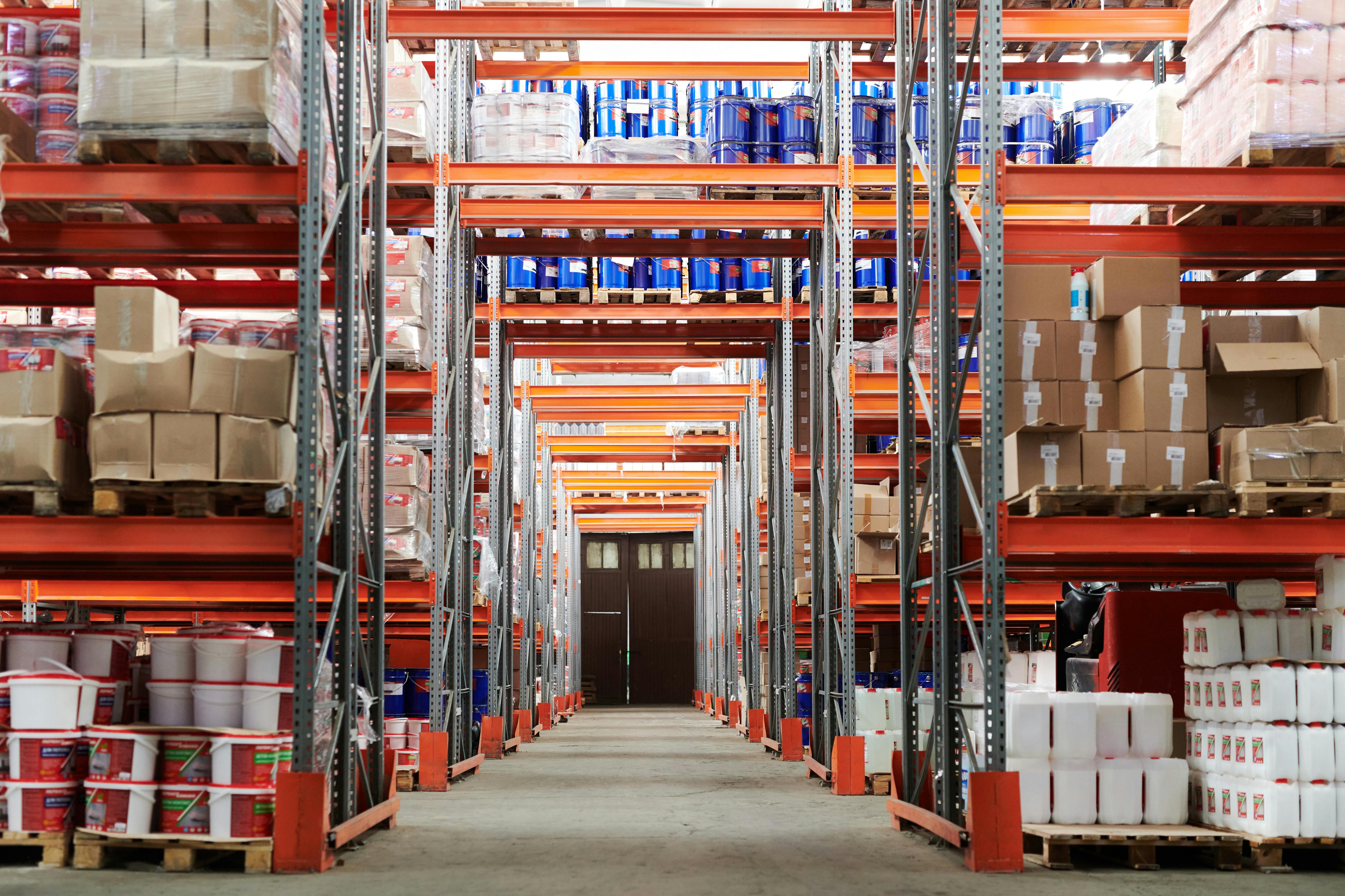 Modern warehouse with organized industrial components on shelving